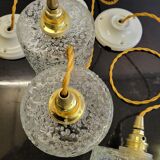Trio of scrambled glass pendant lamps