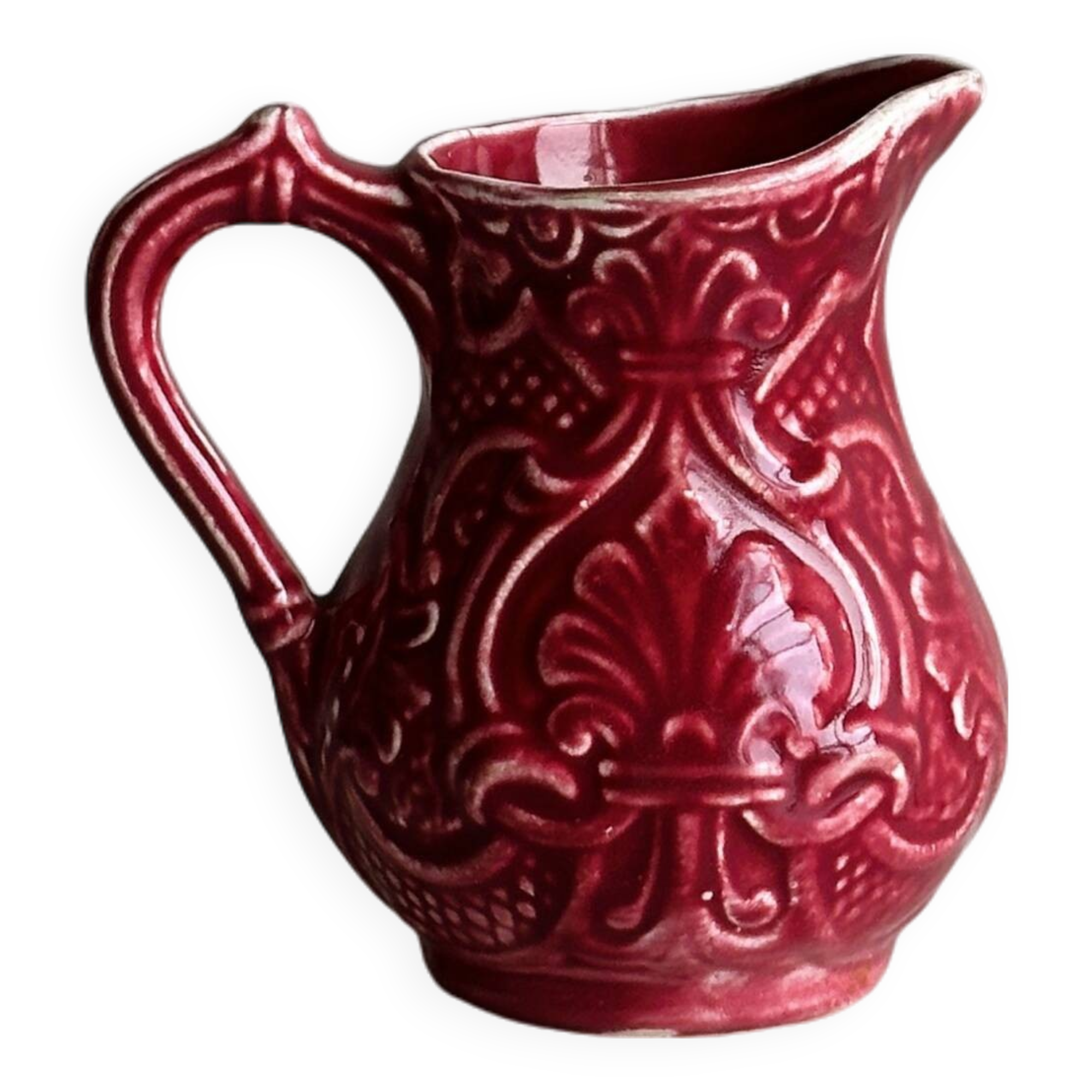 Red ceramic milk jug