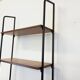 Vintage Italian modular shelving unit in teak and metal from the 1970s