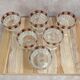 Set of vintage Italian fuchsia and gold cups