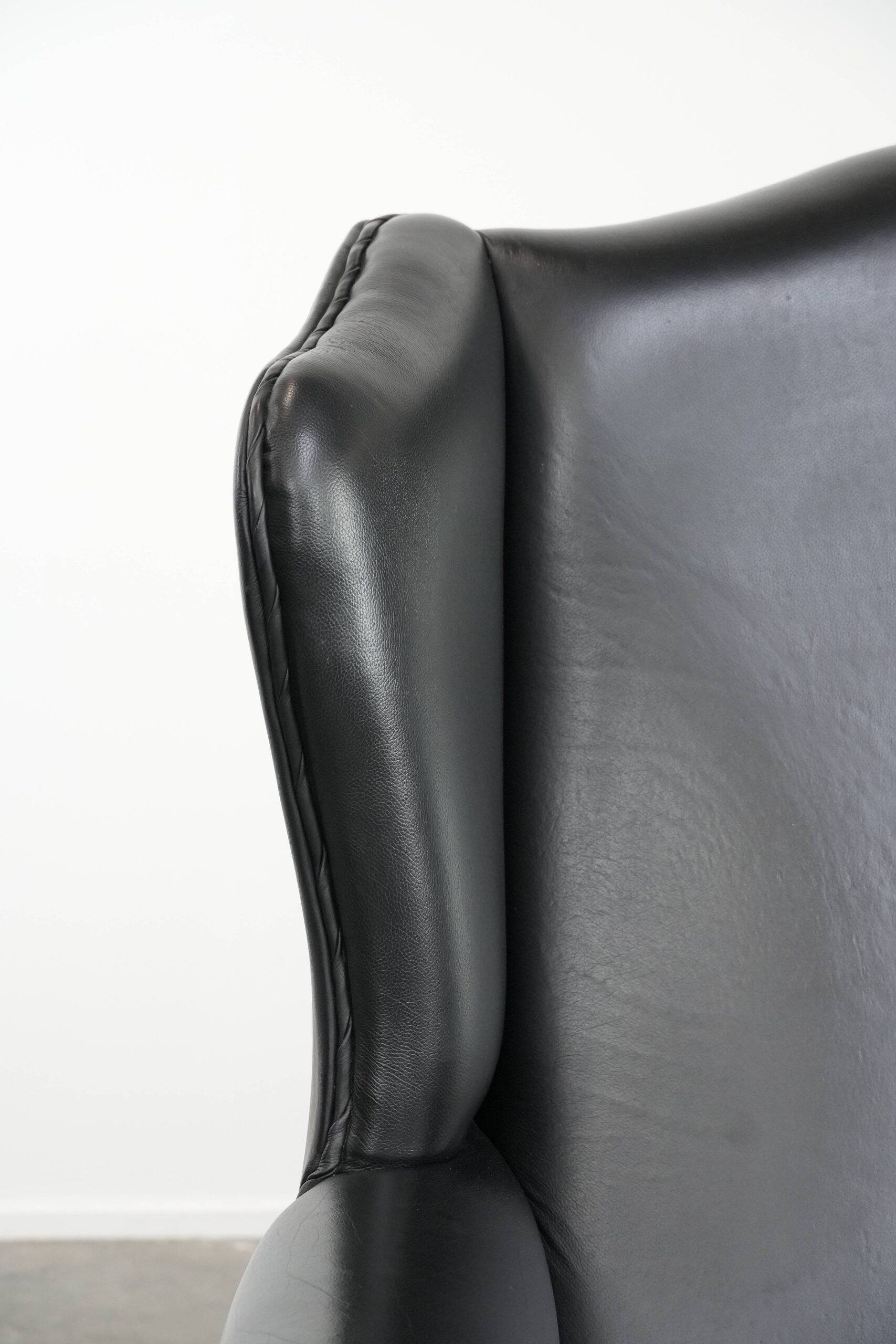Black cowhide leather Chesterfield wingback chair in English style