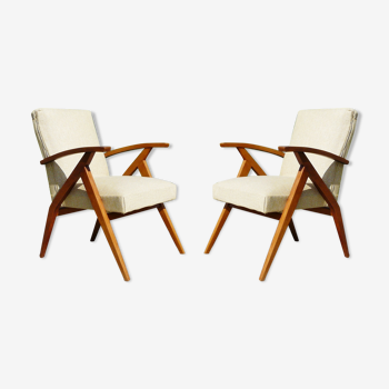 Pair of Scandinavian vintage armchairs in blond wood