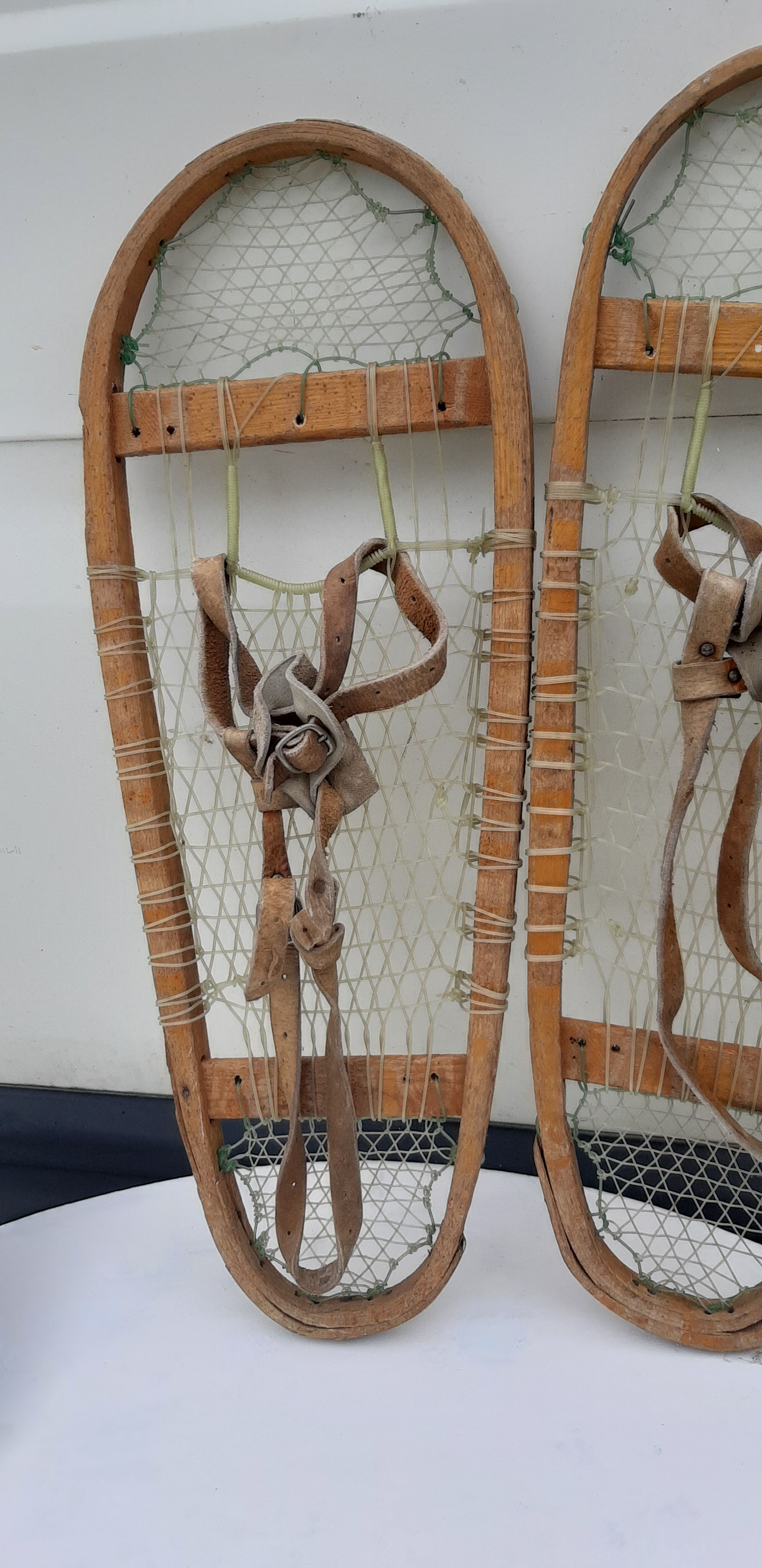 Old snowshoes made of wood and hoses