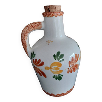 Old earthenware brandy bottle