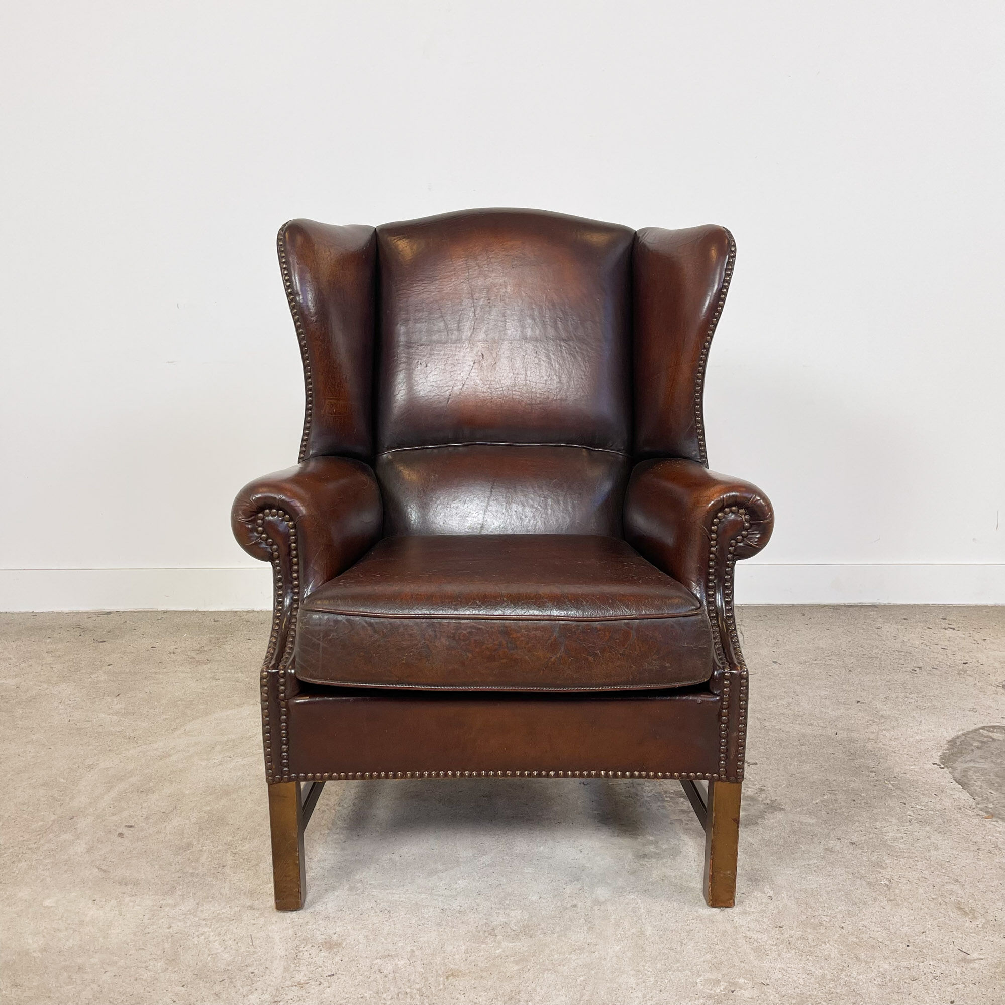 Vintage sheep leather wingback armchair london
