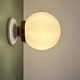 Vintage globe wall or ceiling light in white opaline.