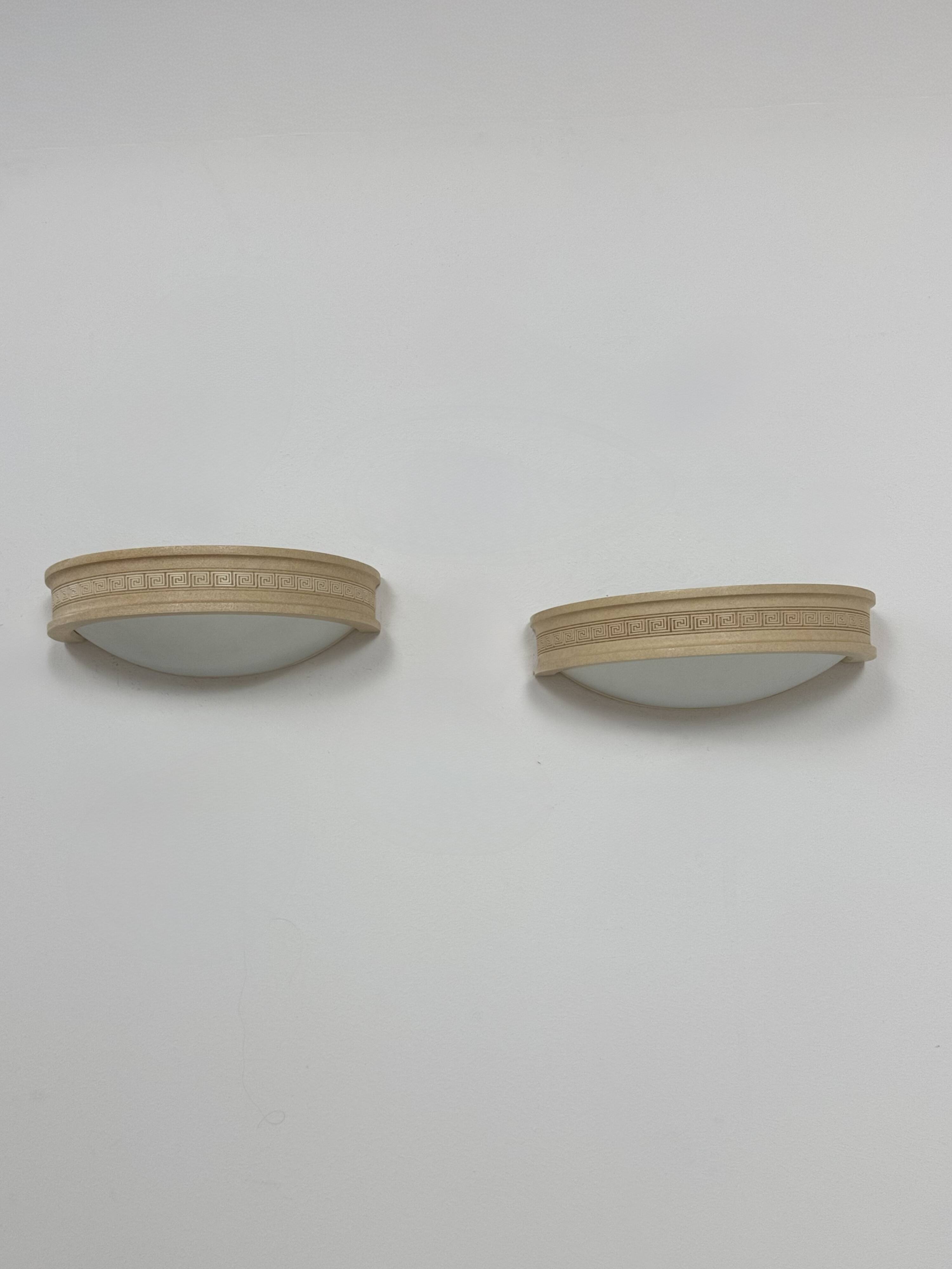 Pair of vintage wall lights, beige plaster and frosted glass, France, 1970.