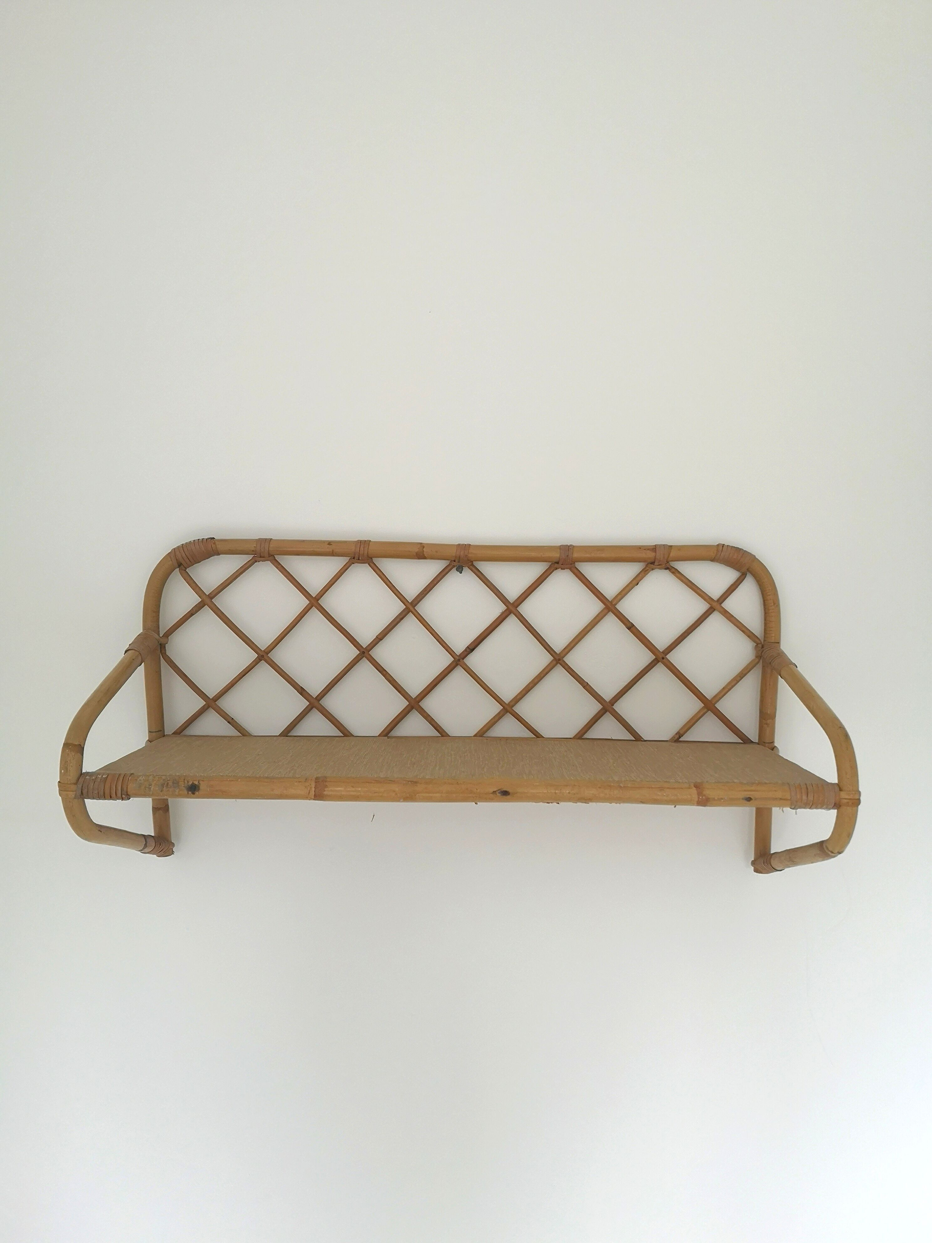 Rattan wall shelf