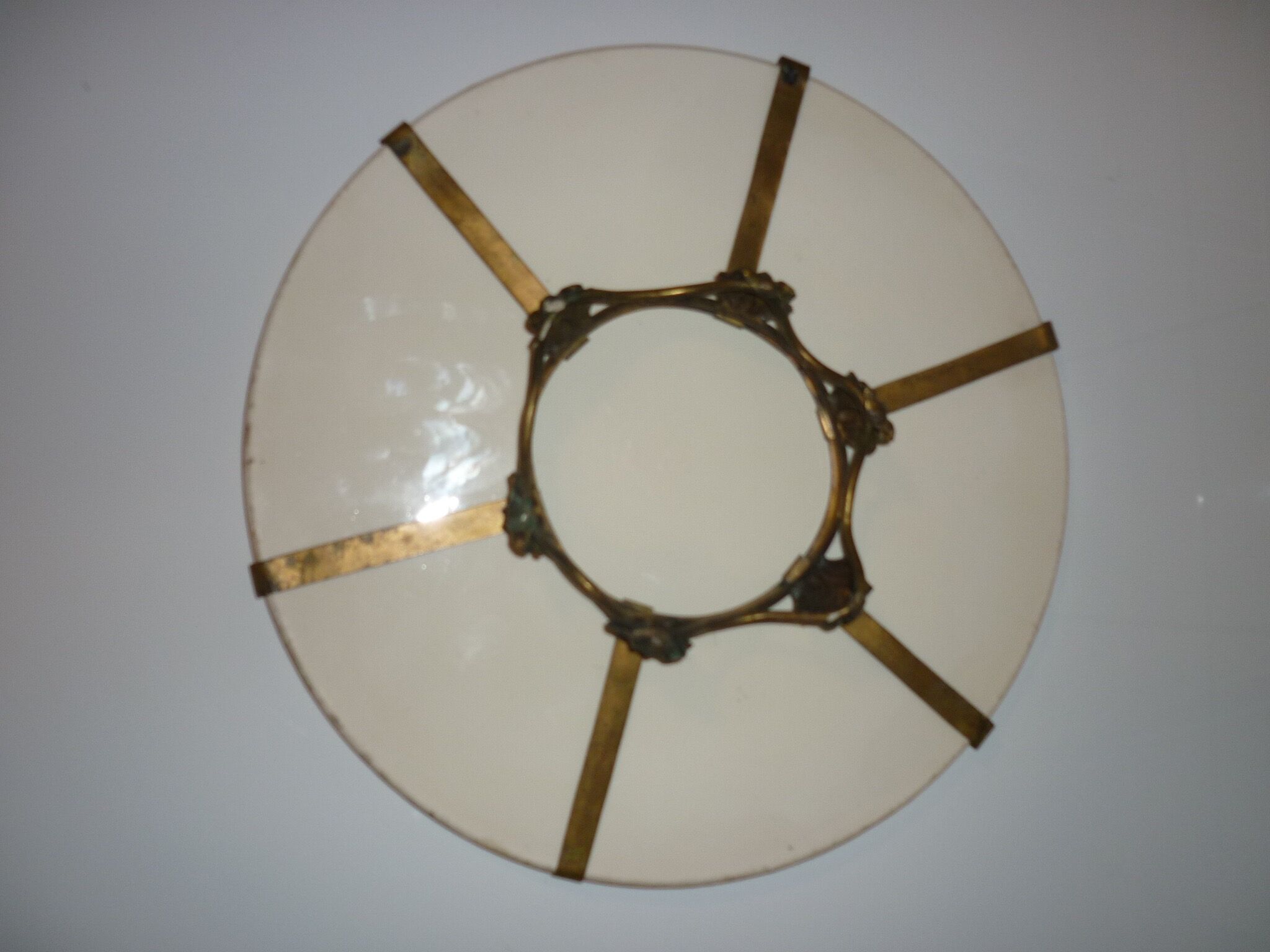 Ceramic plate underside on bronze stand