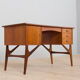 Danish mid century teak desk on sculptural base, 1960s.