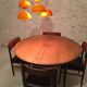 Scandinavian round table in rosewood veneer