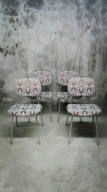 Series of four vintage italian chairs in chrome steel