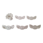 White porcelain knife rest