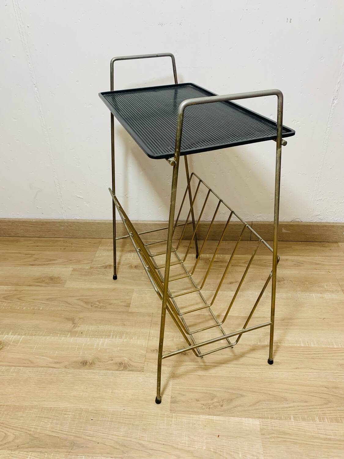 Perforated metal magazine rack