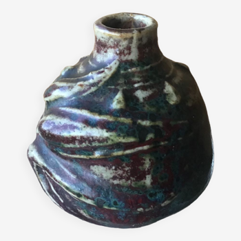 Small Dalpayrat vase shaped ball in polychrome glacured ceramic with relief decoration of a flower signed under the base