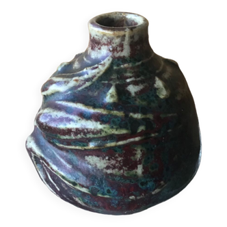 Small Dalpayrat vase shaped ball in polychrome glacured ceramic with relief decoration of a flower signed under the base