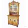 Antique carved wooden sideboard with several sculptures.