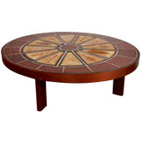 Ovalized coffee table by Roger Capron
