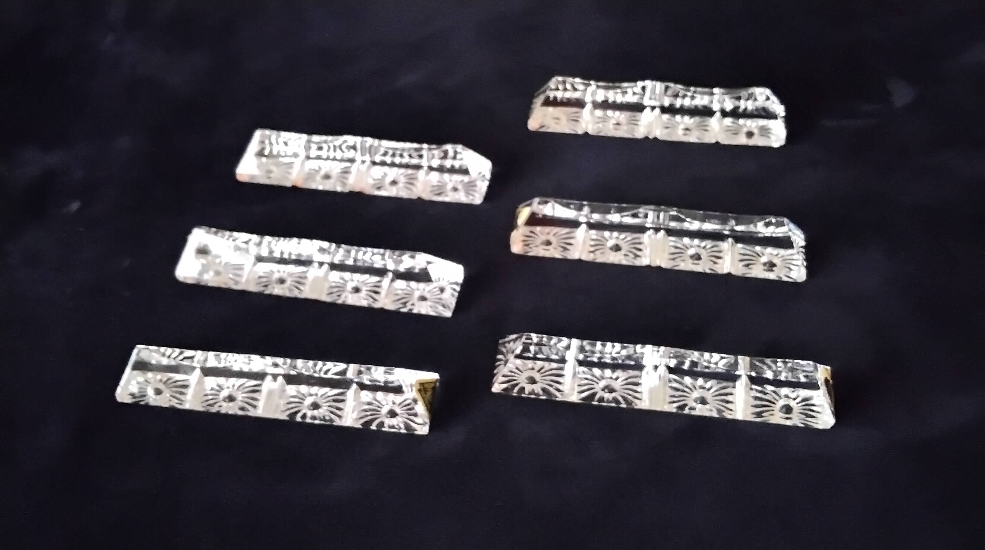 6 triangular-shaped knife rests in lead crystal