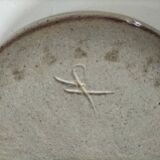 Signed stoneware bowl from Puisaye, relief decoration.