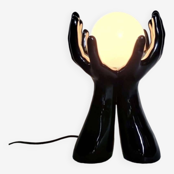 Black and white opaline hand lamp.