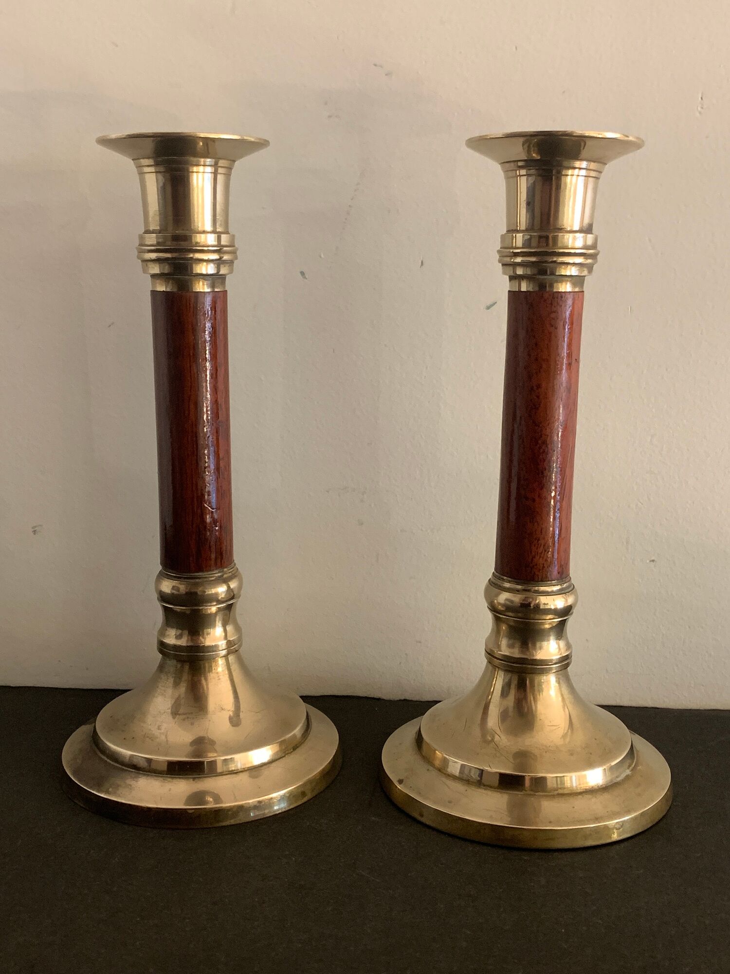 Pair of brass and mahogany wood candle holders