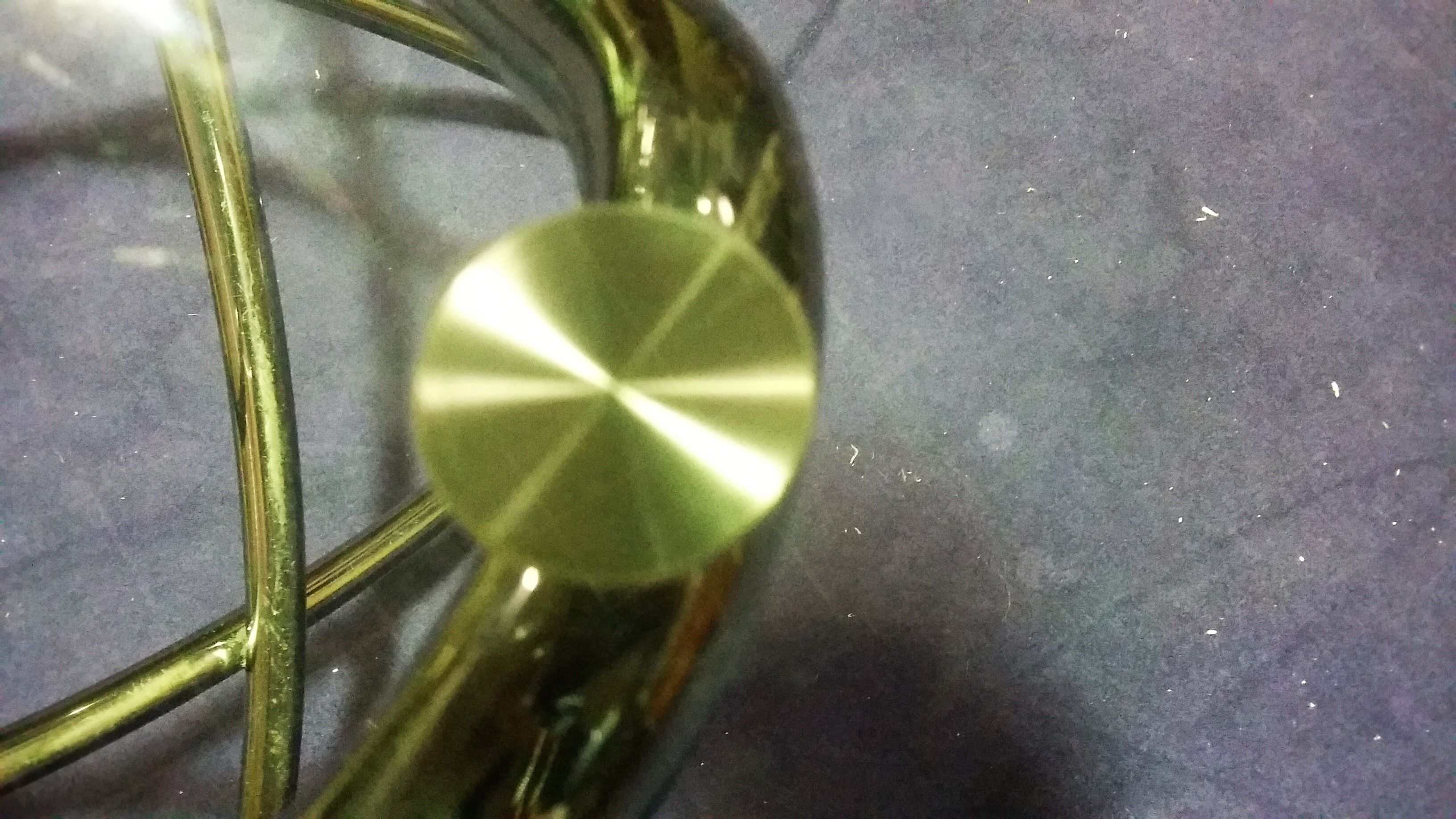 Round table in chrome and glass