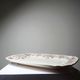 Antique Longchamp serving platter with polychrome daisies in ironstone.