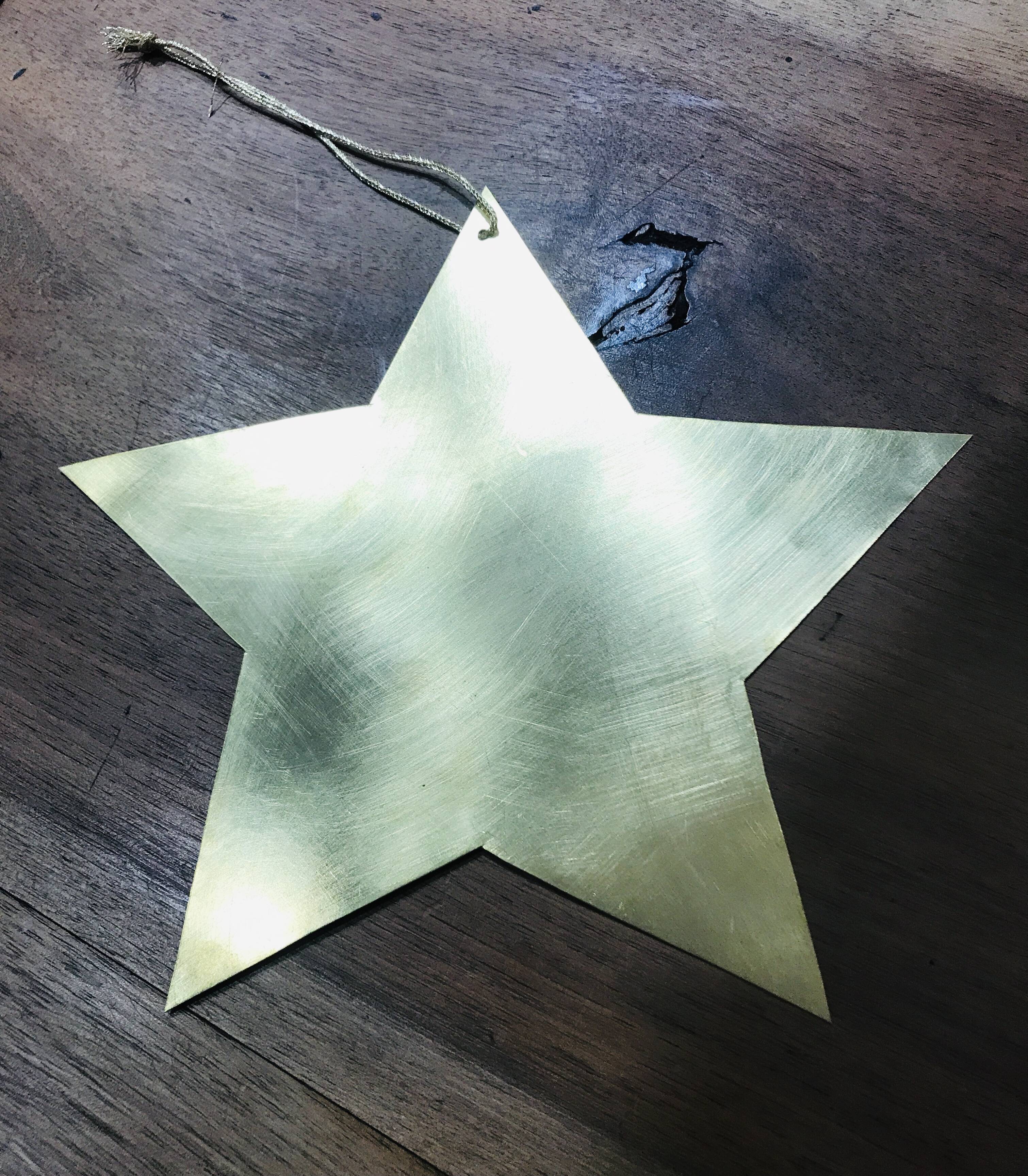 Golden brass star