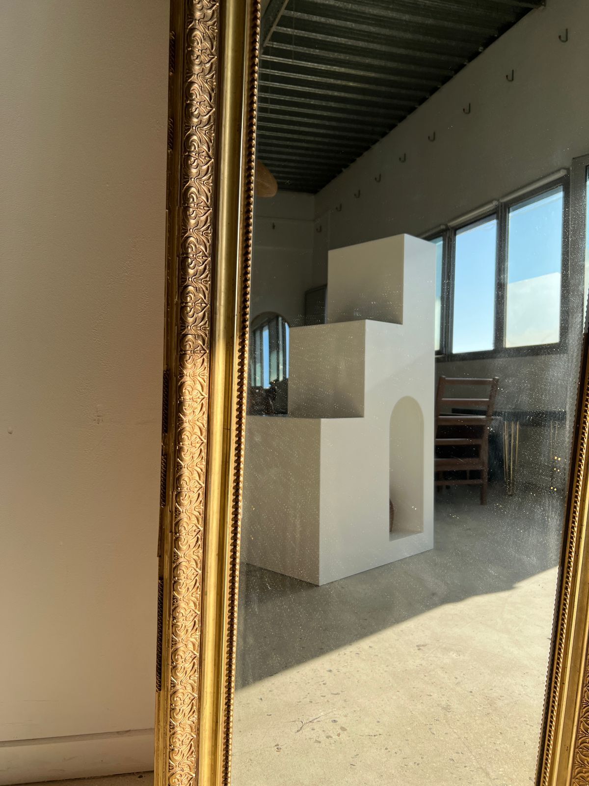 Gilded mirror with frieze h2m10 l:73cm
