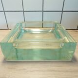 Glass block pocket emptier