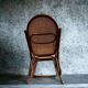 Fauteuil à bascule vintage en rotin