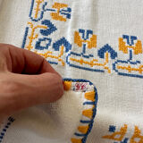 Embroidered white tablecloth