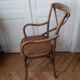Curved wooden armchair
