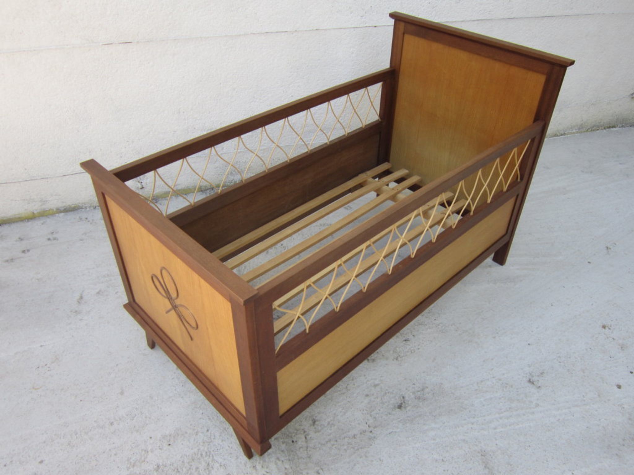 Wood and rattan child bed