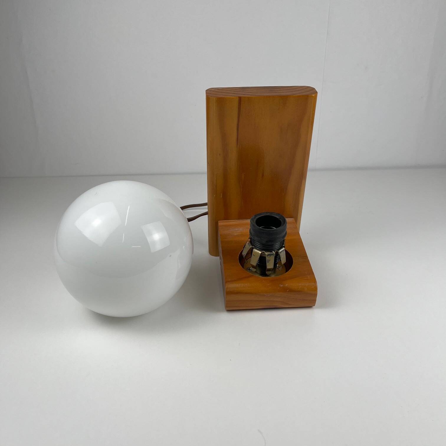 MCM wood and glass wall sconce