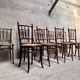 Series of 7 old bar cane cane bistro chairs