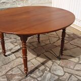 Round oval table with solid cherry leaves, 19th century