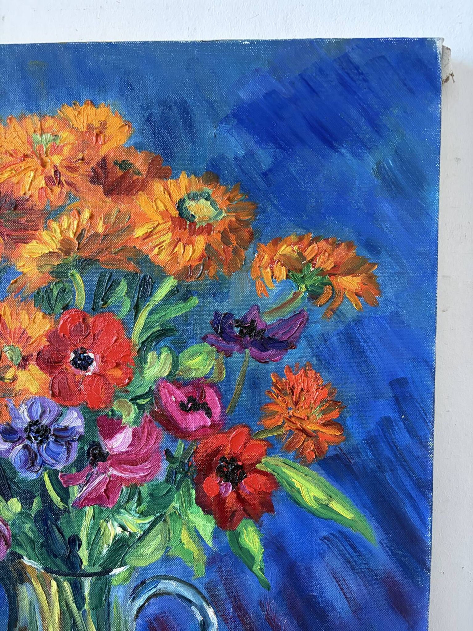 Anemones and marigolds, oil on canvas signed Gisèle Renaut.
