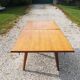 Extendable table with compass legs