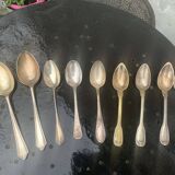 Set of 9 mismatched small spoons in silver metal, 7 small and two medium, art deco