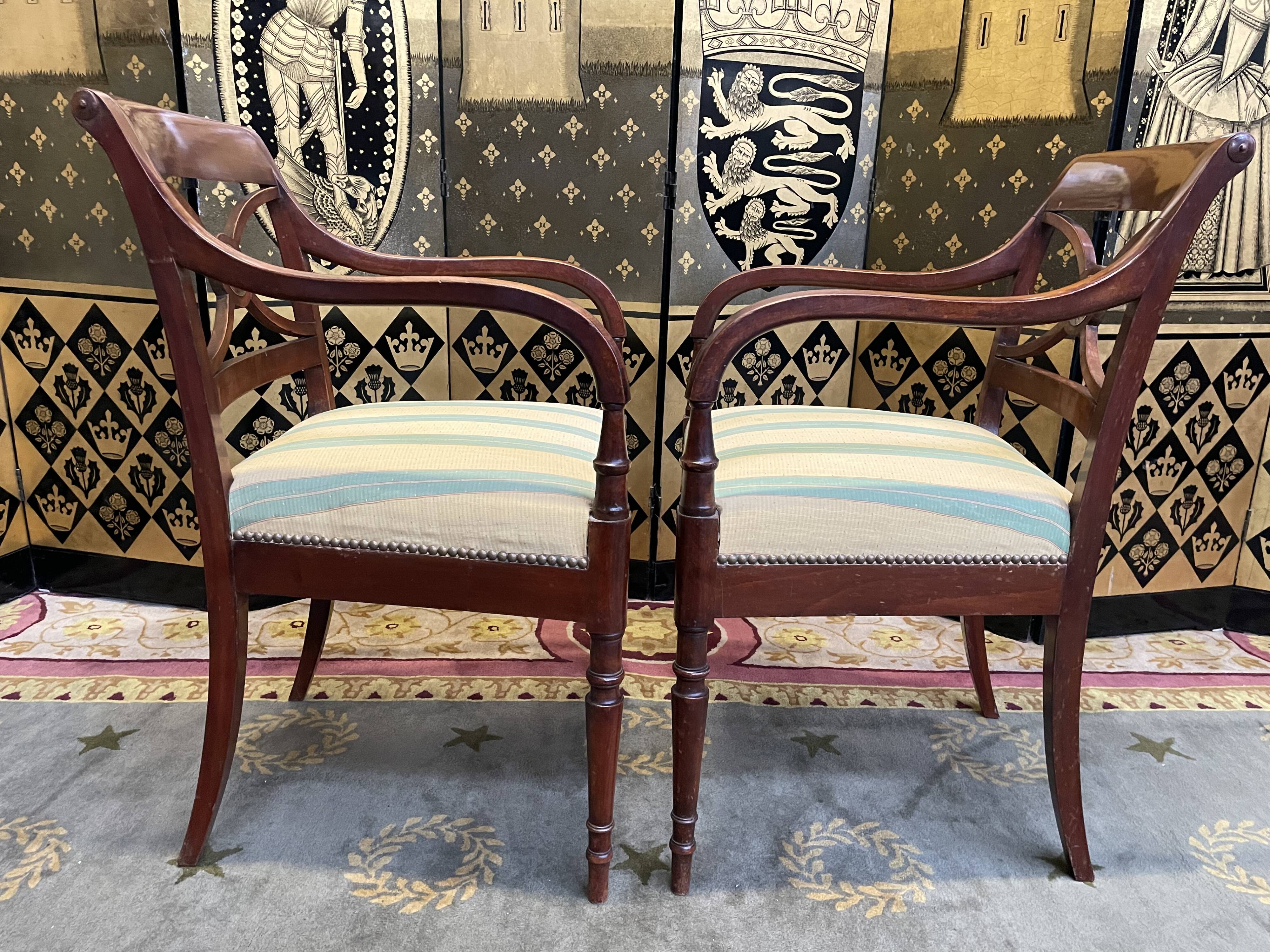 Pair of English mahogany armchairs