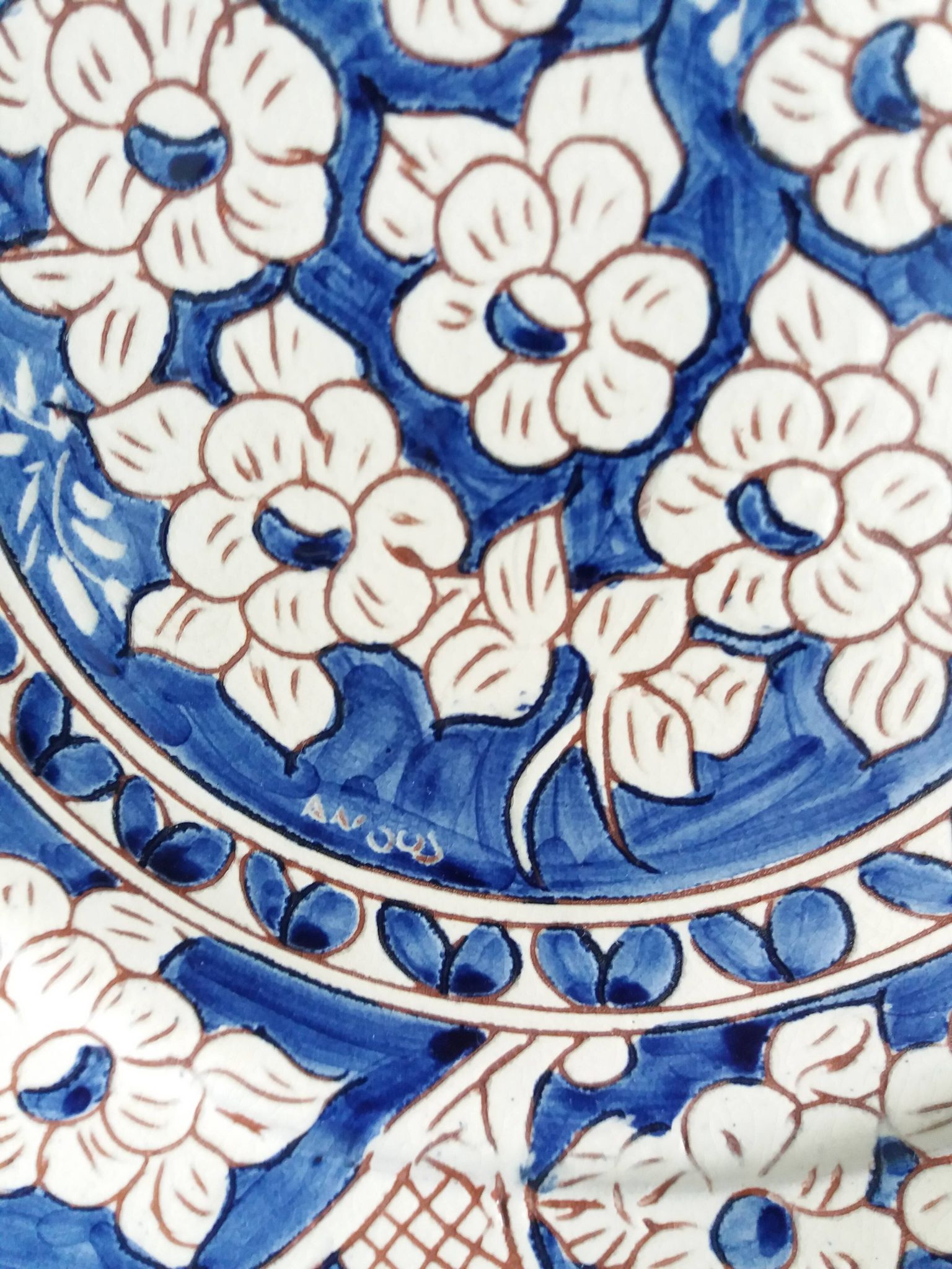 Plate signed Luis Janeiro, Portugal, enamelled terracotta plate