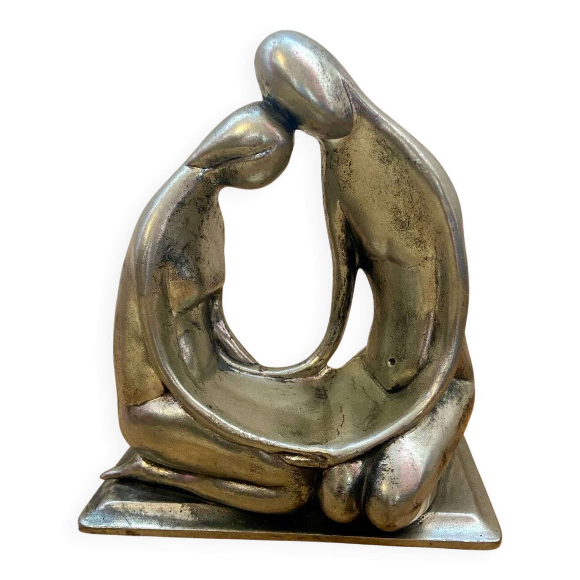 Tin figurine of a couple in love