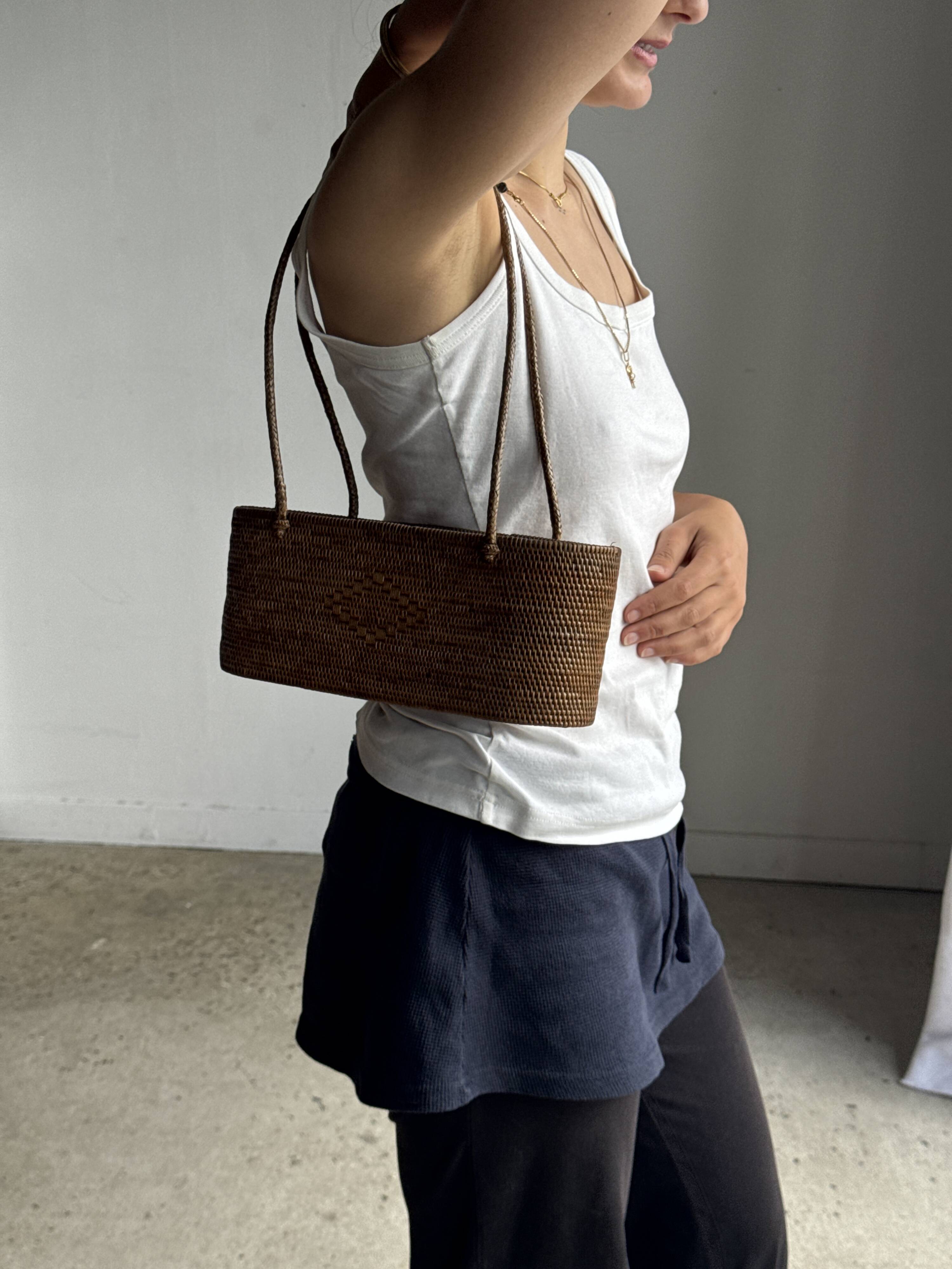 Small oval basket with long handles, traditional Indonesian L28xH10
