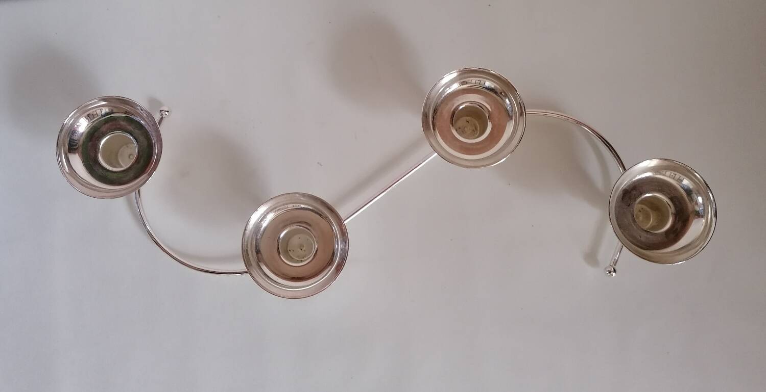 4-light silver metal candle holder
