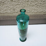 Ancienne bouteille en verre bleu