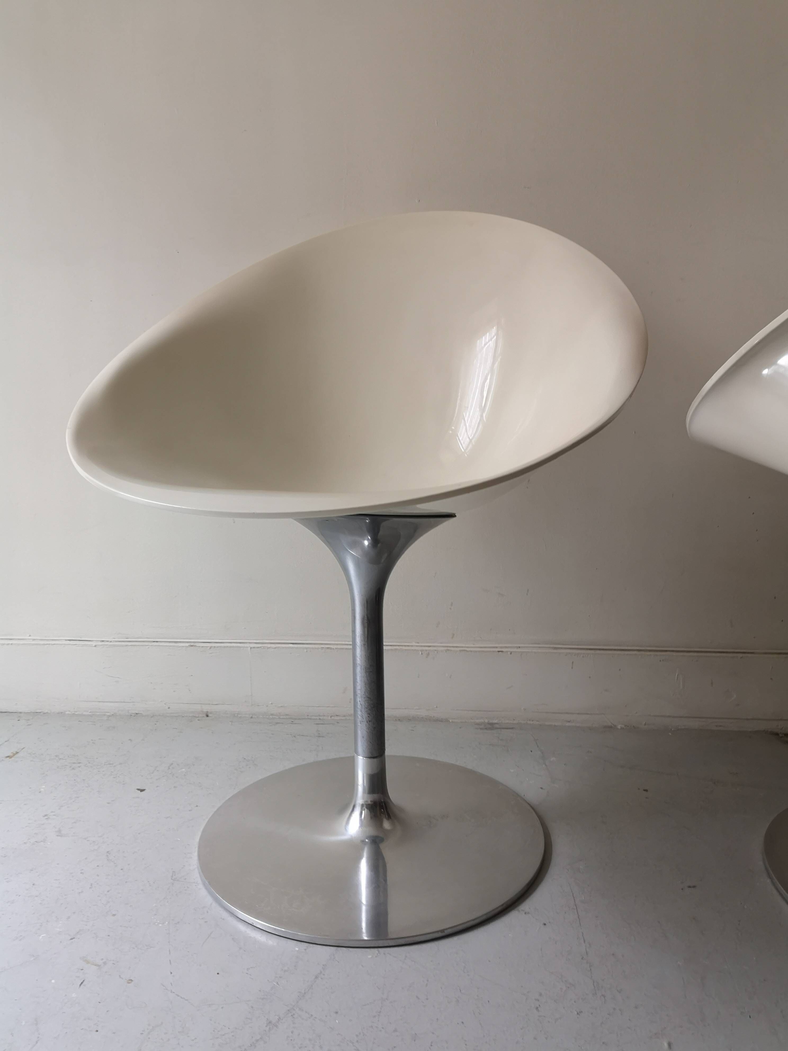 Ero swivel armchair in metal and white shell, p. starck design for kartell
