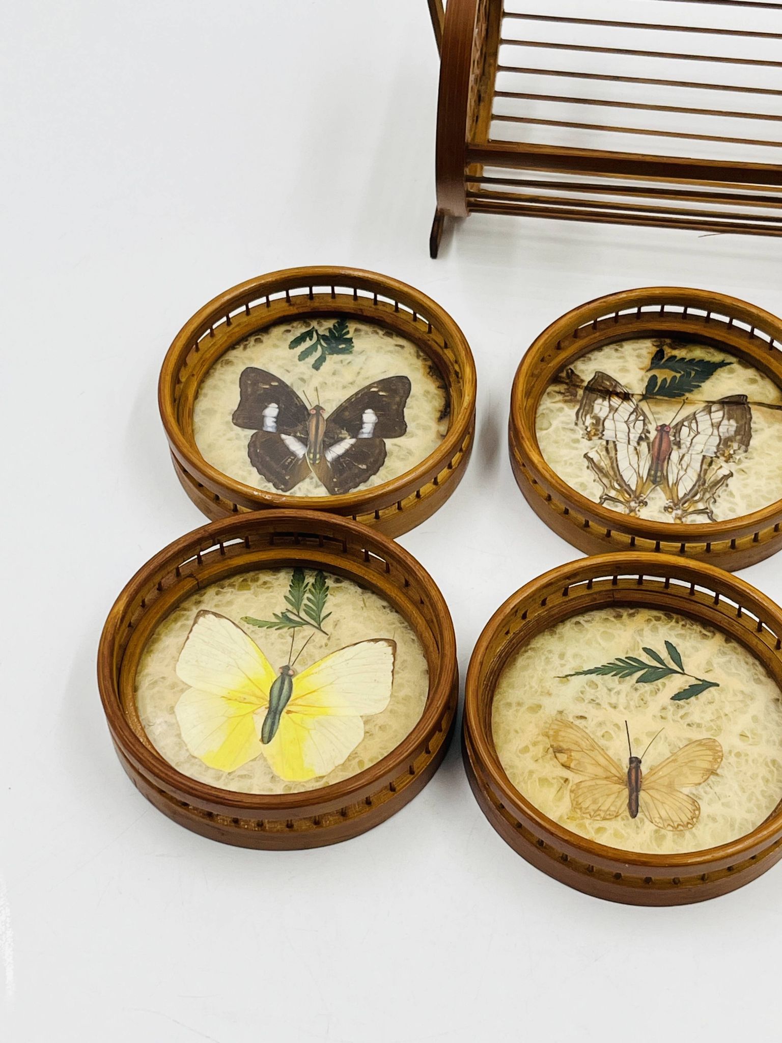 Vintage wooden coaster holder with 6 butterfly coasters.
