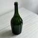 Translucent green glass bottle, classic design.